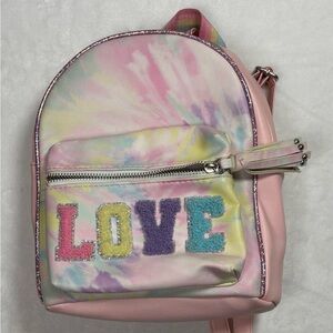OMG Accessories mini backpack, 11” girls’ PVC in pastel tie‑dye With LOVE patch